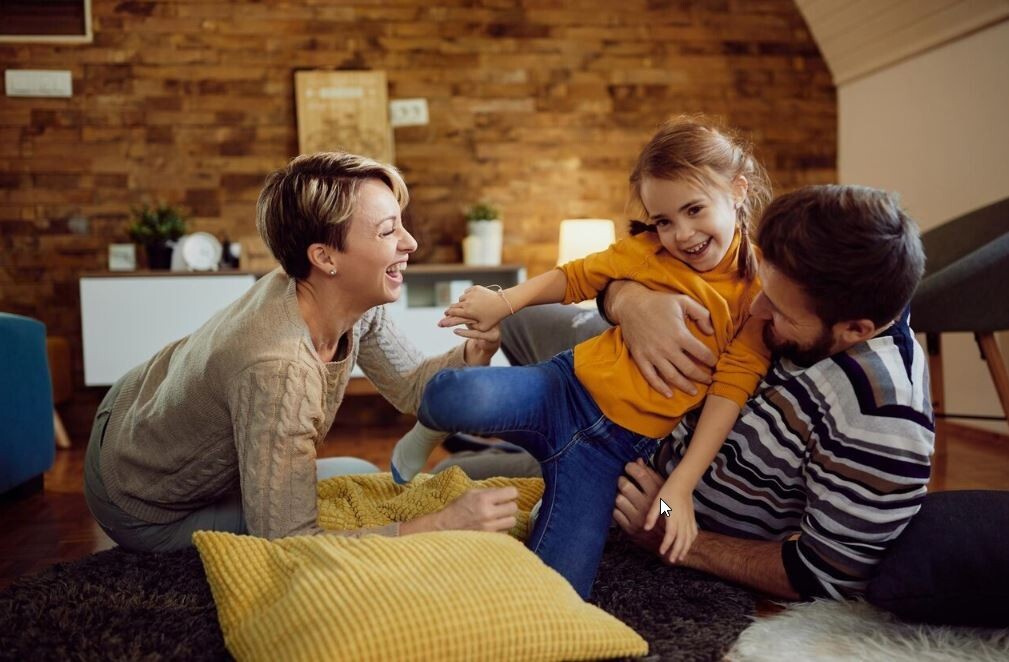 Vader en moeder met kind